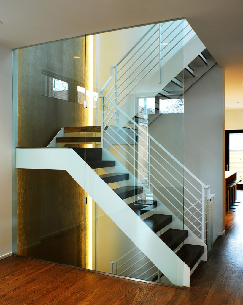 Floating staircase in Condo renovation Formlinea Design Build, Chicago IL