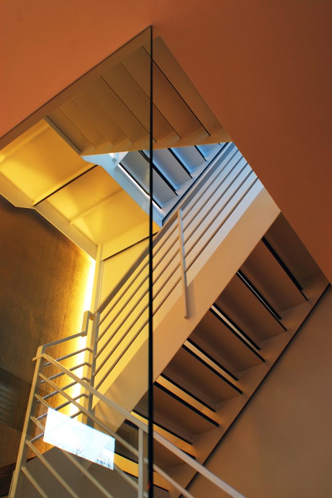 Staircase in a condo renovation Formlinea Design Build, Chicago IL