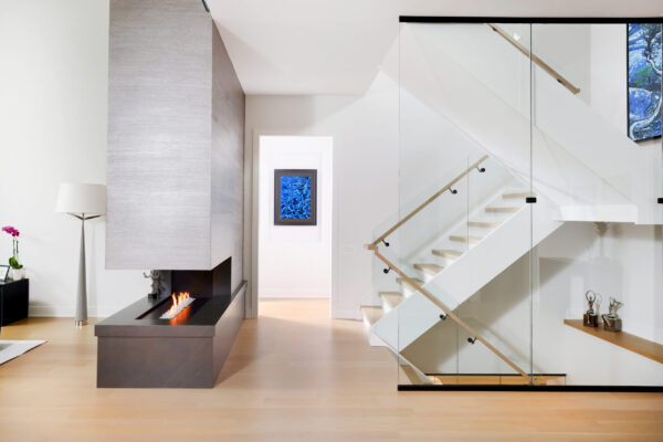 fireplace and staircase custom home FORMLINEA Design Build